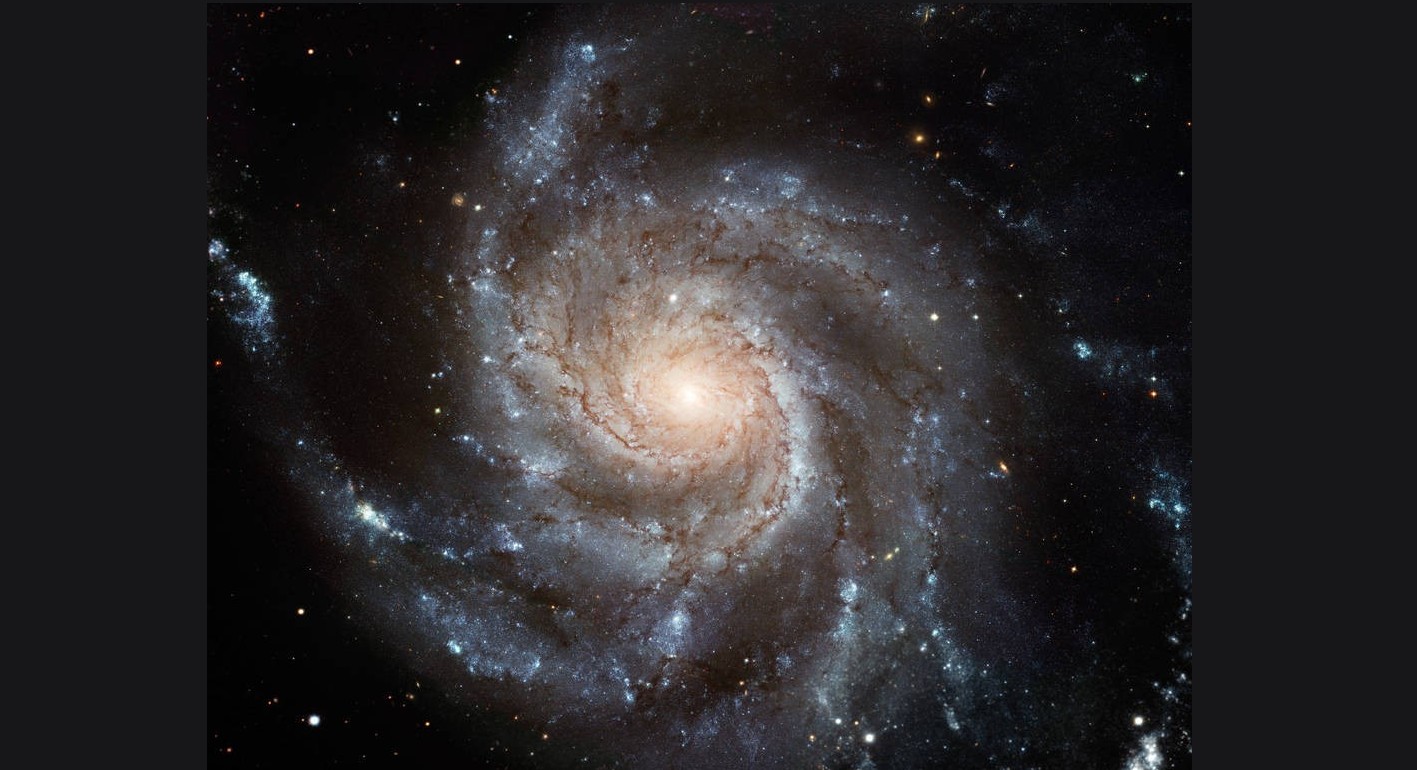 Messier 101 - The Pinwheel Galaxy (Image: NASA, ESA, K. Kuntz (JHU), F. Bresolin (University of Hawaii), J. Trauger (Jet Propulsion Lab), J. Mould (NOAO), Y.-H. Chu (University of Illinois, Urbana) and STScI; CFHT Image: Canada-France-Hawaii Telescope/J.-C. Cuillandre/Coelum; NOAO Image: G. Jacoby, B. Bohannan, M. Hanna/NOAO/AURA/NSF)